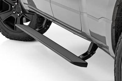 Rough Country Suspension Systems - Rough Country ESR61925 Power Running Boards-Black for 19-26 RAM 1500 Quad