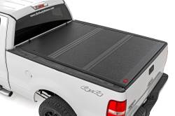 Rough Country Suspension Systems - Rough Country 47214650B Lo-Pro Hard Folding Tonneau Cover 04-14 Ford F150 6.5' - Image 1